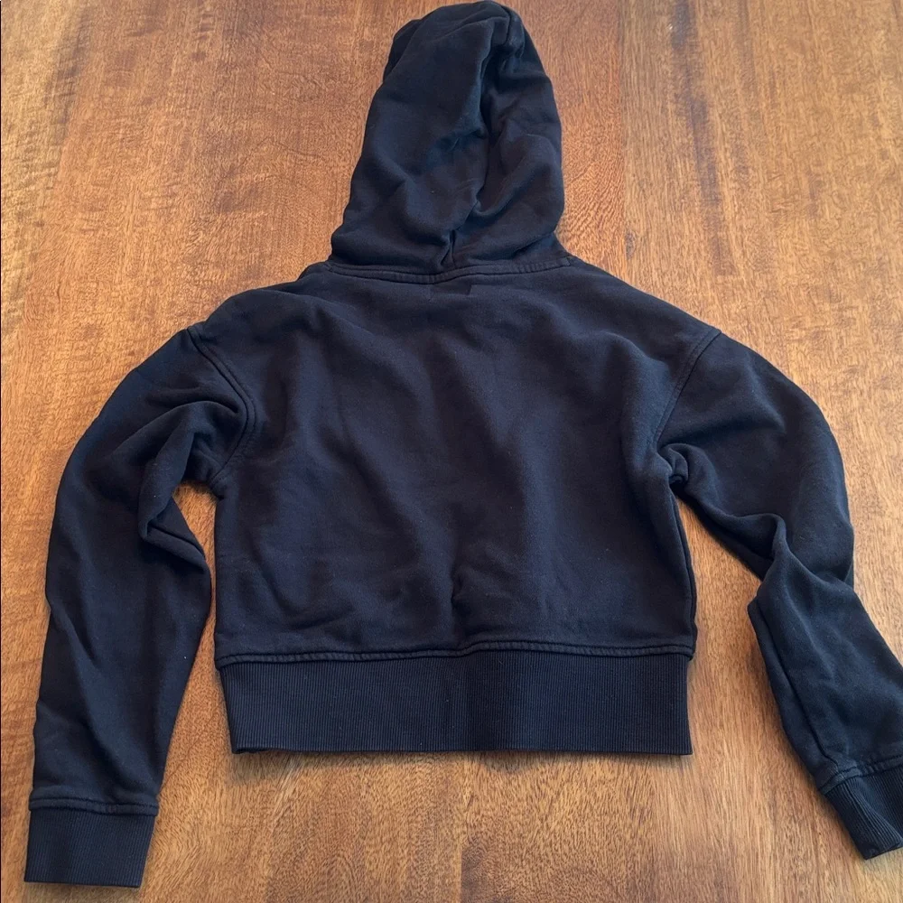 New York College Black Hoodie Sweater with Floral Accent